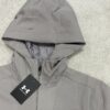 Chándal Under Armour beige