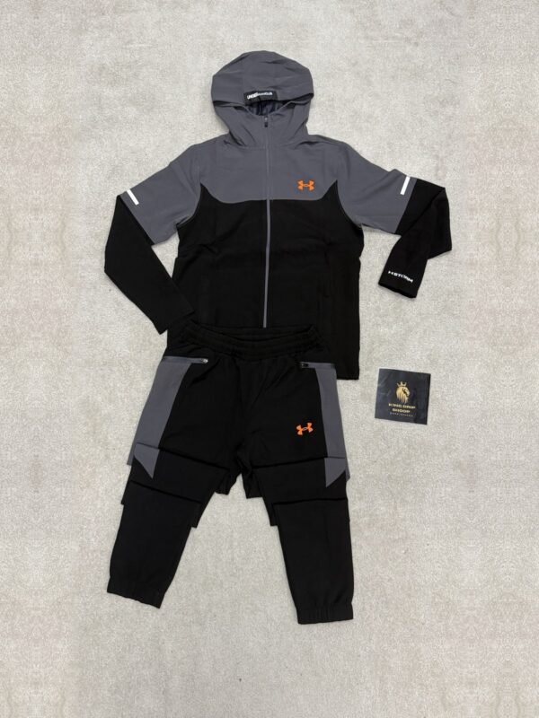 Chándal Under Armour negro y gris