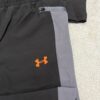Chándal Under Armour negro y gris